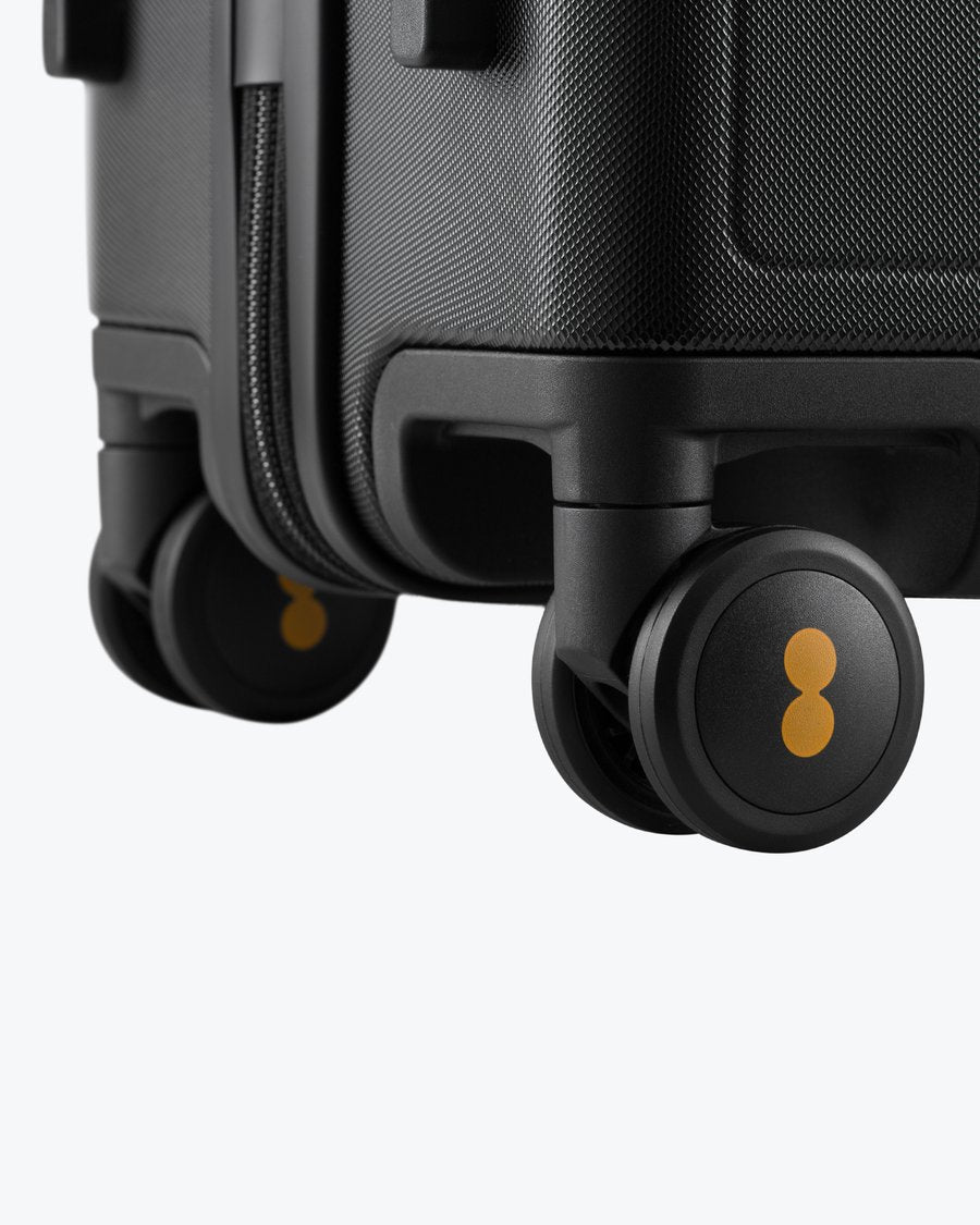 Luminous Textured Carry-On 24'' Black-spinner wheels